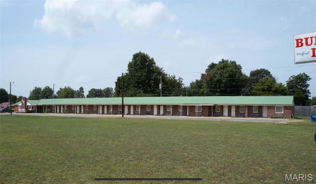 PRIME LOCATION!!! Commercial Property, Current location of Budget Inn, Kennett, Missouri. Turn key Business opportunity or the best location in town for New Commercial Business.  VERY HIGH TRAFFIC AREA!  Located just past the intersection of Highway 412 and First Street. Just South of Wal Mart. 4 Lane State Highway with turning . 1.56 Acres M/L with 309' of Highway frontage.
NO OWNER FINANCING -MOTIVATED SELLER - MAKE THE SELELR AN OFFER. Location: High Traffic