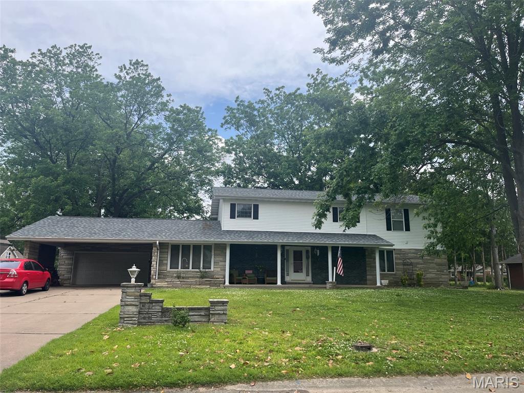 Space, comfort, and thoughtful updates come together in this impressive 5 bedroom, 4.5 bath home- just one block from Chaffee Elementary School! The main level features a convenient primary suite, large living room with a cozy fireplace, and kitchen equipped with a newer refrigerator and range. Step outside to the expansive screened porch- the perfect spot to relax and enjoy the backyard. Upstairs, four additional bedrooms off plenty of room for family, guests or a home office. The finished basement adds even more living space with a generous family room anchored by a second fireplace and a 4 bath, plus abundant storage throughout. Major updates provide peace of mind: a new roof (2025), new water heater (Mar 2026), and a new sump pump means a few of the big ticket items are done. This one checks all the boxes- Don't Miss it!
