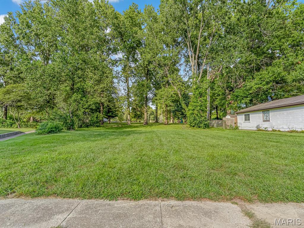 Affordable homeownership can start from the ground up! This residential lot offers an opportunity to create a home that fits both your needs and your budget in a quiet, established neighborhood. Whether you're considering new construction or looking for a more affordable path to homeownership, this property offers flexibility—including the option for a manufactured home when placed on a permanent fixed foundation. Imagine choosing your home, your finishes, and your layout while avoiding the price tag that often comes with an existing home. With an affordable lot as your starting point, the possibility of owning a place of your own may be closer than you think. Bring your plans and explore the potential!
Buyer to verify building requirements, manufactured-home requirements, utilities, zoning, permits, and any other applicable restrictions with the appropriate local authorities.