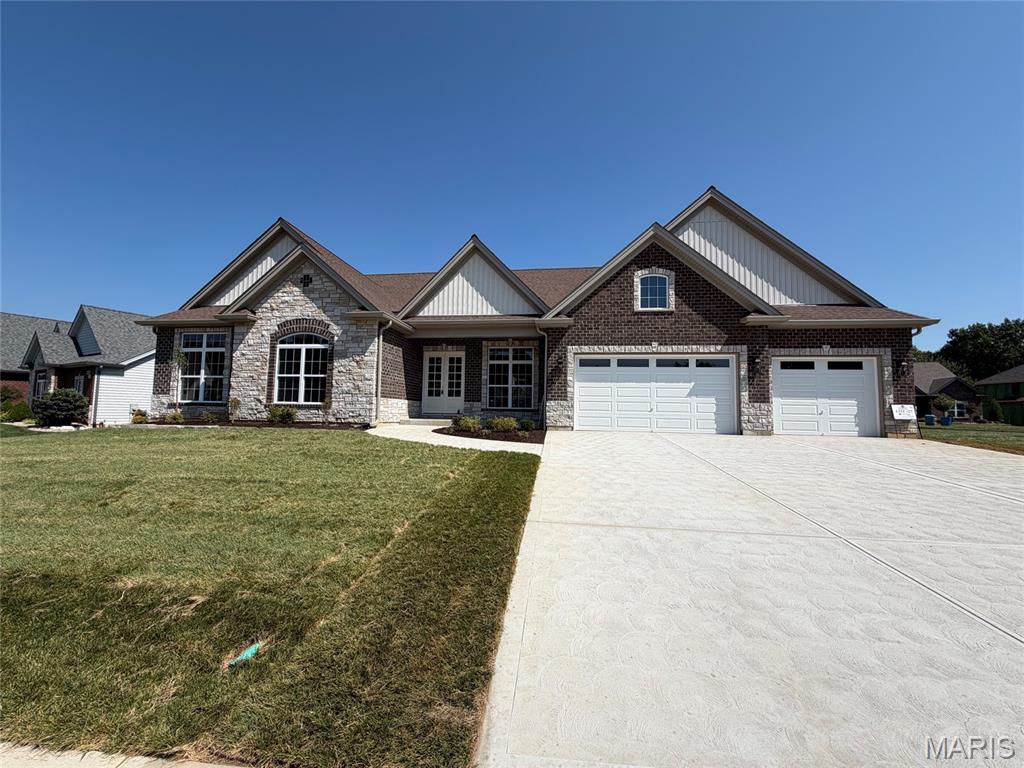 Update-  Cabinets and counter tops are in!!   Do you really want New Construction without the months of hassle and waiting? Let's make this your dream home!!  Built by Executive Homes the Baywood XL is one of the most popular floorplans with a split bedroom layout.  This home is under roof and will be ready for it's new owner(s) before school starts..  Engineered wood flooring throughout, beautiful floor to ceiling see through fireplace in great room and on the covered patio.  The kitchen comes with Stainless Steel appliances including a gas range with an electric wall oven and microwave combination and a large center island.  The dining room  can be a study or office and the primary bedroom is coffered with a bay window.  In the primary bathroom you will find a freestanding soaking tub with dual vanities and walk in shower. 10 foot ceilings with 8 foot doors throughout.  All on one floor!! Bellevaux is an exclusive neighborhood with only 30 lots of Custom Homes all built by Executive Homes there is no through traffic in Bellevaux. Come see this one now!!  Please excuse our dust as this home is still under construction.  Sod and Landscaping is in!!