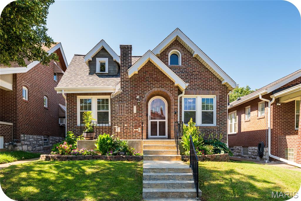 Everything is coming up roses at 5432 Rosa - character, charm, and modern updates perfectly blend in this Princeton Heights brick beauty! The gorgeous landscaping and welcoming front porch highlight the special "gingerbread" curb appeal that South City is known for. Step through the arched wooden front door and immediately notice the natural light that floods the home. This unique layout features both a convenient coat closet and a spacious bonus office/den (with another closet) off the entryway. A large living room is highlighted by stunning stained-glass windows, decorative brick fireplace, gleaming hardwood floors, and an arched opening that leads into the sizable formal dining room. At the heart of the home is the updated kitchen, including stainless steel appliances (all stay!), butcher block counters, cute coffee bar, and practical pantry. Both bedrooms are light and bright with ceiling fans and ample closet space, and the adorable bathroom features even more storage: another closet and a new vanity. The sweet sunroom leads out back to a fully fenced yard, a patio perfect for grillin' and chillin', more lovely landscaping, and a massive 2-car garage! Laundry (washer and dryer included!), more storage, and even hang out space await in the clean basement. For added peace of mind, recent functional updates include new architectural roof (2026), furnace and water heater (both 2022). Situated on a tree-lined street with convenient access to shops and restaurants on Macklind Avenue (Onesto Pizza & Trattoria, Zoomies Pet Cafe, Clementine's Ice Cream to name a few), the location can't be beat. Don't miss this dream home at a realistic price!