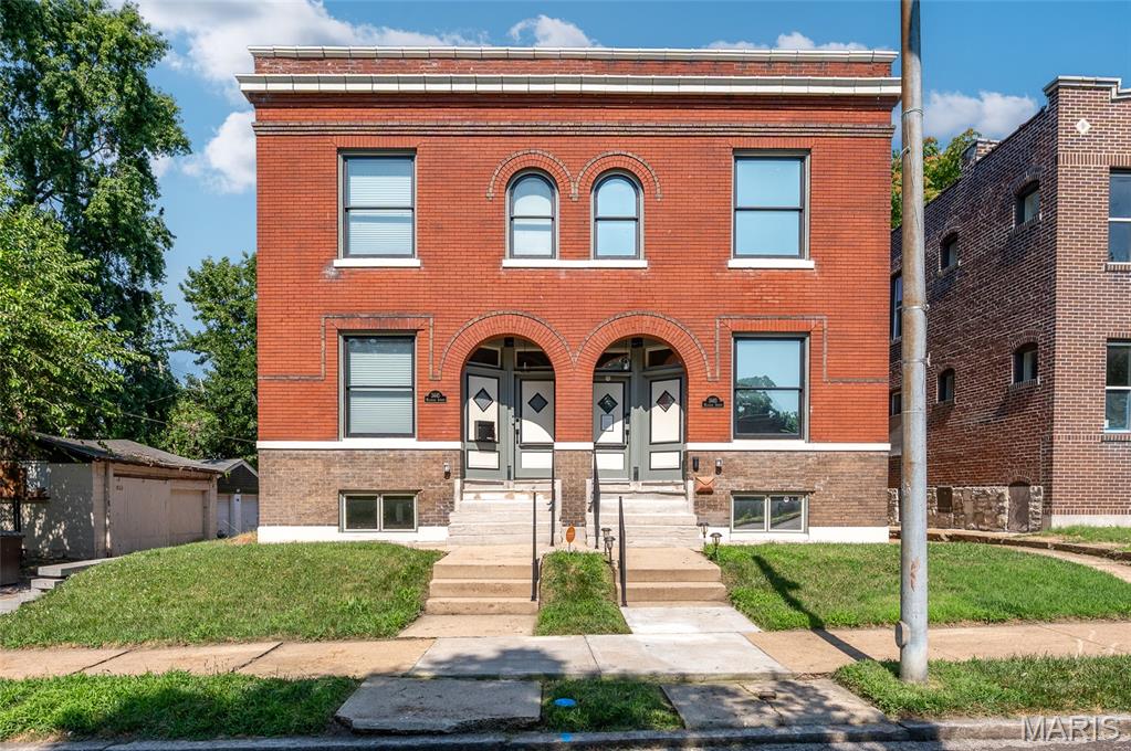 Historic charm meets modern living in this 3 bedroom home just off Cherokee Street! As you enter the front door, you will fall in love with the open concept living space. The formal dining room flows right into the living area, making this a fantastic home to entertain! The updated kitchen features loads up white shaker cabinetry, center island, and quartz counters! The primary bedroom suite boasts exposed brick walls and en-suite bathroom with walk-in shower and double vanity! 2 additional bedrooms, full bathroom, and laundry room round off the second level! The basement is unfinished and provides plenty of storage space. Fenced backyard and 2 car "car-age"! All this home is missing is... YOU! Call for your private showing today! Buyer to verify all MLS data.