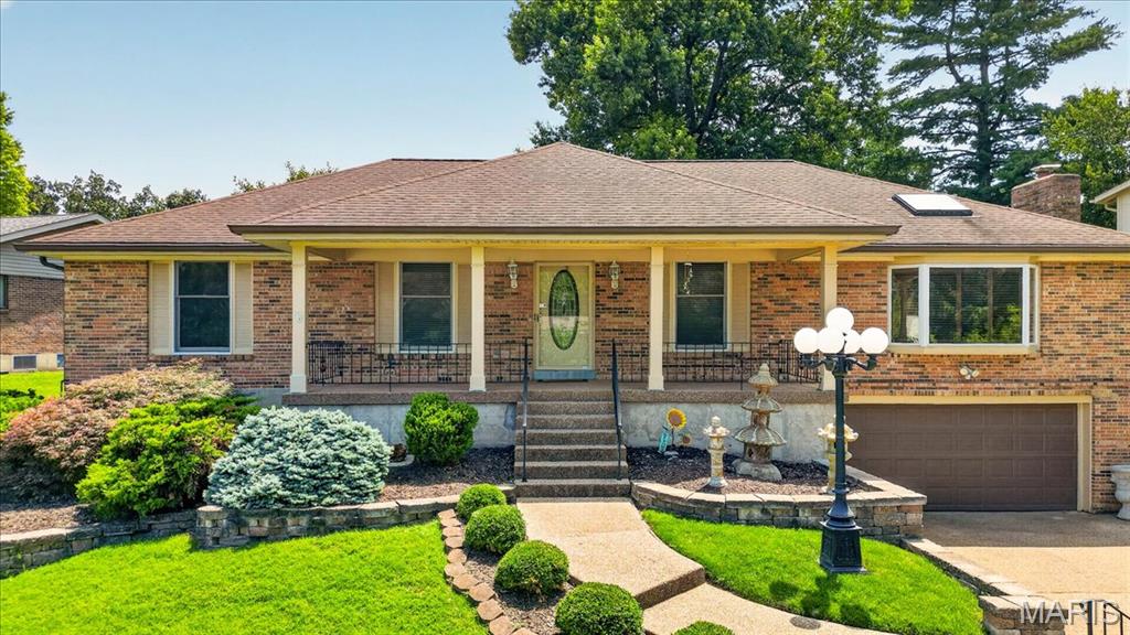 Welcome home to this beautiful all-brick ranch offering 3 bedrooms and 3 full bathrooms. The spacious great room is filled with natural light and boasts a wood burning fireplace, skylight, bay window and hardwood floors, creating a warm & inviting atmosphere.  The kitchen features stainless steel appliances, granite countertops, double wall ovens and a large walk-in pantry. There is also a separate dining room.  The living room can be used as another sitting room or maybe a home office or playroom?  The primary suite offers hardwood flooring, crown molding, a private en-suite bathroom, his-and-her closets (one is a walk in cedar closet with a built in safe).  The main floor includes 2 additional bedrooms, a 2nd full bath w/a relaxing jetted tub and a convenient main-floor laundry room adding to the home's functionality.  The finished lower level provides additional living space with a large recreation room complete with a bar, a comfortable family room, a kitchenette, a third full bathroom featuring a separate shower & a jetted tub, a cedar closet and still plenty of storage space.  Enjoy peaceful mornings on the spacious covered front porch or unwind in the evening on the private patio just off the kitchen. Recent updates provide added peace of mind, including a new HVAC system and 75-gallon water heater installed approximately two years ago, while the roof is approximately eight years old.  Completing this home is an oversized garage - offering plenty of room for vehicles, storage and/or a workshop. This well-maintained ranch combines comfort & convenience and is ready for you to call it home.
