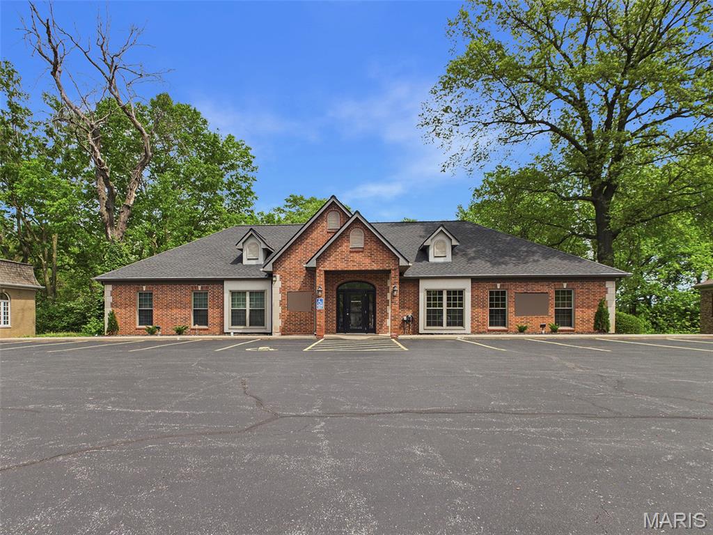Nicely updated and well kept office building for sale in secluded business park setting.  The property is set up currently as 3 units, two on the main floor and one large basement unit. One of the units on the main floor is owner occupied, and the other unit as well as the basement unit have tenants on short term leases($4,300 p/m gross rent). On the main floor of the property in Unit 1 there is a waiting area, bullpen/workspace, 2 offices, 1 conference room, back office area with storage and two restrooms which are shared with Unit 2. Unit 2 has a waiting area, large bullpen/workspace, 4 offices, a conference room, kitchenette and shares the two restrooms with Unit 1. The basement has an IT room, large storage area and Unit 3. In Unit 3 there are 7 multi-purpose rooms/offices, large workspace/bullpen area, conference room, 2 alcoves(copy area)  and 2 restrooms. The property would be ideal for a owner user to occupy the whole space, or one who wants to have some rental income while only occupying a portion of the property. Overall this a great property and don't want to miss such a good opportunity.