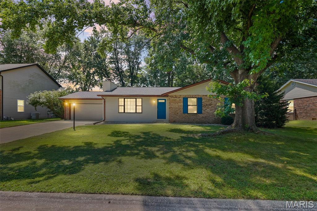 Welcome to 121 Turnbridge Drive in Swansea! This well-maintained 3-bedroom, 2-bath ranch offers approximately 1,374 square feet of comfortable, single-level living with an attached 2-car garage and a fully fenced backyard.

Step inside to a spacious living room featuring laminate flooring, a large picture window that brings in plenty of natural light, and a wood-burning fireplace that creates a warm focal point for the space. The adjoining dining room provides plenty of room for gatherings and flows conveniently into the updated kitchen. The kitchen features quartz countertops, shaker-style soft-close cabinetry, tile backsplash, and a complete appliance package. 

The primary bedroom includes two windows, a ceiling fan, a walk-in-style closet, and a private en-suite bathroom with tile flooring and a walk-in shower. Two additional bedrooms, a second full bathroom with tub/shower combination, and convenient main-level laundry complete the interior.

Outside, enjoy a fully fenced backyard with a paver patio offering additional space for outdoor entertaining and relaxation. The attached 2-car garage provides generous parking and storage along with an automatic garage door opener and attic access.

With an updated kitchen, newer roof, newer water heater, main-level laundry, fenced yard, and functional ranch layout, 121 Turnbridge Drive offers a great combination of updates, space, and convenience. Schedule your showing and see everything this Swansea home has to offer!