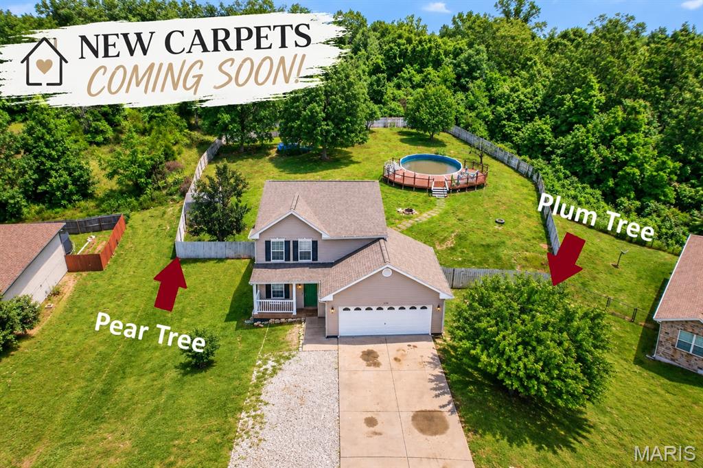 Spacious 4-bedroom, 3.5-bath home in Westridge Estates, conveniently located less than 7 min to Fort Leonard Wood! Offering nearly 2994 sq ft with two living areas, a gas fireplace, fenced backyard, above-ground pool with deck, large shed, extra parking, and fruit trees. The finished walk-out basement features a bedroom, full bathroom, and living room, offering great potential for an in-law suite or private guest space. The backyard is VERY large and fenced in! Plenty of room to for fun.  A flexible home with plenty of space inside and out! Roof is 2023. Carpets will be Newly replaced soon!
