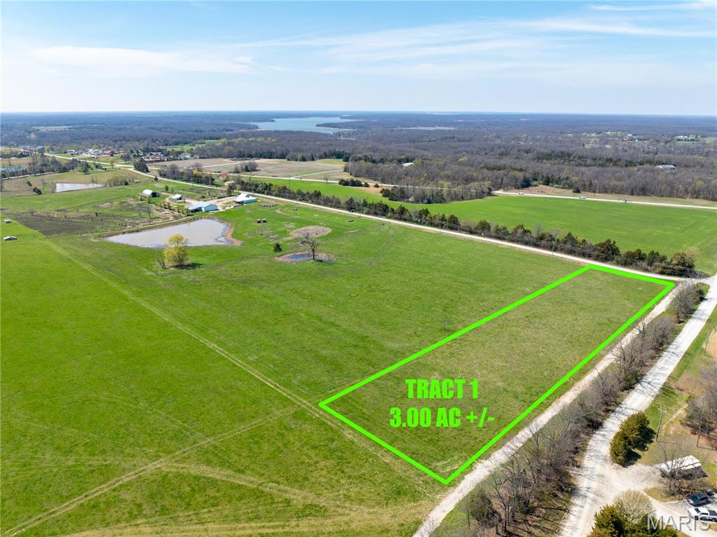 Location, Location, Location!!  This 3 acre tract is the perfect location for you Mark Twain Lake getaway!  Located just off Highway J, this tract is close to all lake amenities.  Be to Jellystone Park, Spaulding Beach & Boat Ramp, Blackjack Marina, Cannon Dam and restaurants within minutes!  This 3 acre tract is being sold unrestricted, so the possibilities are endless!  Build your dream shouse, lake cabin or create your family RV getaway.  With water on the property and electric and fiber at the road you are set up for convenience to get your dream property set up quick and affordably.  Four (3 acre) tracts are available in total, buy one or all four!  This would be an excellent location for a small campground or boat storage!!   Call today before this one is gone!!