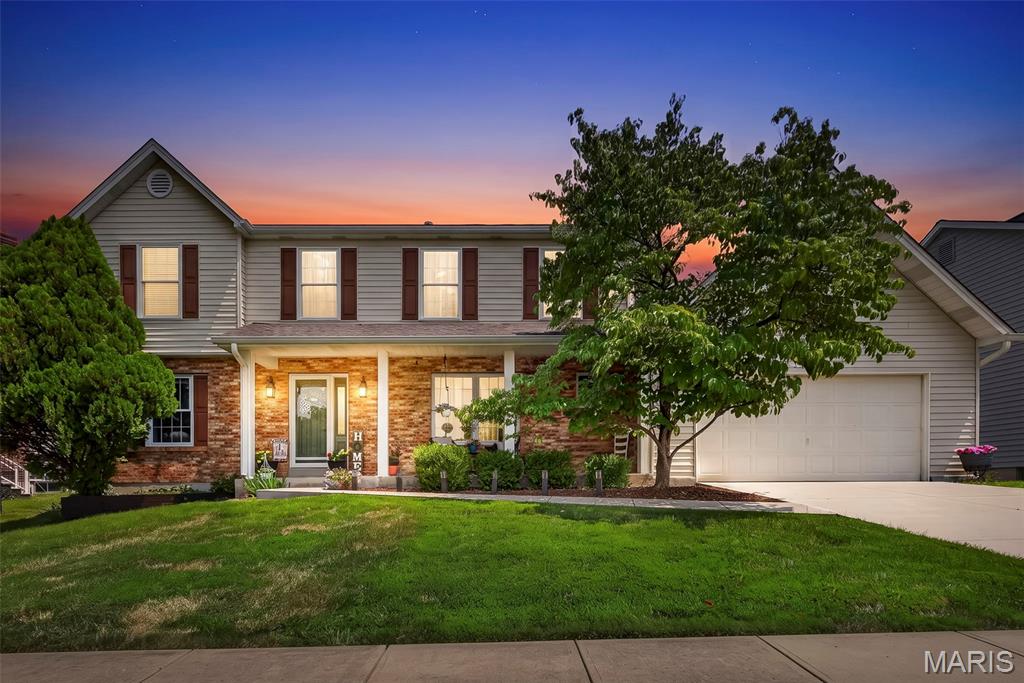Welcome Home to this beautifully update 2-Story Home offering over 2,500 sq ft of comfortable living space, not to mention the added living area in the partially finished basement. Featuring 4 bedrooms, 3 bathrooms and 2 fireplaces, 1 wood-burning and 1 electric. This home offers the perfect combination of warmth and functionality with class. The recently remodeled kitchen showcases updated cabinetry, granite counter tops, subway tile backsplash and plenty of work space for cooking and entertaining. Updated flooring flows throughout the home, while the update bathrooms provide modern finishes and style. The spacious Primary Suite features a HUGE walk-in closet, creating a private retreat and space you'll love, separate tub and shower. Additional updates include a new water heater, a 2-year new HVAC system and newer exterior flatwork with a stamped concrete patio, providing the perfect outdoor space for relaxing or entertaining family and friends. Step outside to enjoy the beautifully landscaped yard filled with gorgeous flowers. Located in a quiet subdivision within the highly sought after Francis Howell School District, this move-in ready home has been meticulously maintained and is ready for it's next owners to create lasting memories.