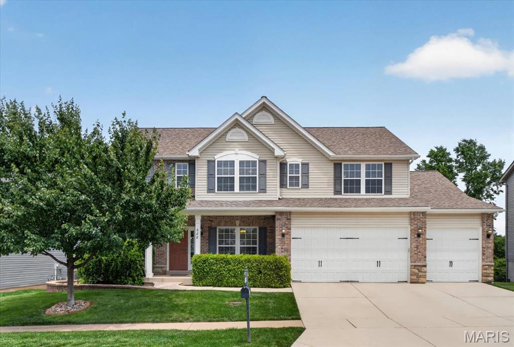 Beautifully maintained newer home, built in 2013, offering an expansive open floor plan filled with natural light from abundant windows throughout. Nestled on a quiet cul-de-sac and backing to mature trees, this home provides both privacy and a peaceful setting.
The inviting main level features a private office with glass French doors just off the entry, a formal dining room, and a spacious family room anchored by a cozy gas fireplace. The gourmet kitchen is designed for both everyday living and entertaining, showcasing extensive cabinetry, a large center island, granite countertops, double ovens, a smooth-top electric cooktop, stainless steel appliances, a planning desk, and a walk-in pantry.
Convenience abounds with a main-floor laundry/mudroom located just off the oversized 3-car garage. Upstairs, you'll find a generous loft area perfect for a second living space, playroom, or study area. The spacious primary suite features a large walk-in closet and a luxurious ensuite bath with dual vanities, a soaking tub, and separate shower. Three additional bedrooms complete the upper level, including two connected by a Jack-and-Jill bath with dual sinks, plus a third full bath accessible from the hall. The walk-out lower level includes a finished room ideal as a bedroom, guest suite, office, or fitness room, along with a full bath. There's still ample unfinished space for storage and future expansion.
Outdoor living is equally impressive with a low-maintenance composite deck with stairs leading to a concrete patio and a fully fenced backyard—perfect for relaxing, entertaining, or enjoying the wooded views. This exceptional home combines generous living spaces, thoughtful design, and a desirable cul-de-sac location in a beautiful natural setting.