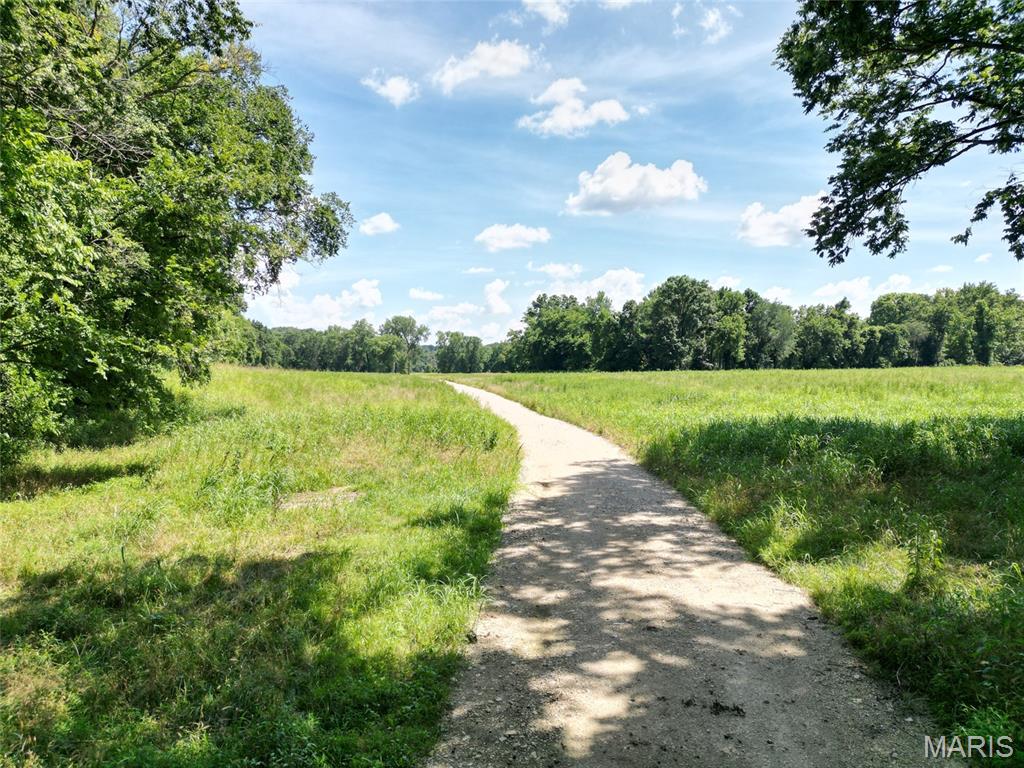 This land offers a versatile mix of wooded terrain and open ground, ideal for hunting, hiking, camping, and weekend recreation. Abundant wildlife makes it an excellent property for deer and turkey hunting, while the manageable acreage allows for easy access throughout the tract. Whether you’re setting up trail cameras, creating food plots, or simply enjoying the privacy of your own outdoor retreat, this property is ready to be enjoyed.

With quick access to Festus amenities and a short drive to St. Louis, you can enjoy the best of both worlds; rural seclusion with city convenience. Tracts of this size with creek access in such a prime location are hard to find. 

This lot is recreational only, not a build site, due to being in a flood plain.