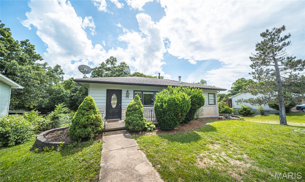 Spacious, versatile, and full of charm, this beautiful home in Camdenton offers approximately 2,100 square feet +/- of living space and plenty of room to spread out! Featuring 3 bedrooms and 2 large bathrooms, this property provides the perfect combination of comfort, functionality, and outdoor enjoyment. Step inside to find a welcoming living room highlighted by a cozy wood burning stove, creating the perfect gathering space during cooler months. The home's generous layout offers ample living space for family and guests, while the lower level includes an additional room that could easily serve as a non-conforming 4th bedroom, home office, hobby room, or guest space. Outdoor living is a standout feature of this property! Enjoy relaxing mornings or evening gatherings on the partially covered deck overlooking the backyard. Stairs lead directly down to a large concrete patio beneath the deck, offering even more space for entertaining, grilling, or simply enjoying the outdoors. A welcoming front patio adds additional curb appeal and outdoor seating options. Situated on a .26-acre lot, the backyard provides plenty of room for recreation, gardening, or pets, and includes a storage shed for all your lawn equipment and tools. The carport offers convenient covered parking, while the extra dishwasher currently on the property will convey with the sale, providing added value for the new owner. Whether you're looking for extra living space, flexible room options, great outdoor entertaining areas, or a convenient Camdenton location, this property has something for everyone. Schedule your private showing today and discover all the possibilities this home has to offer!