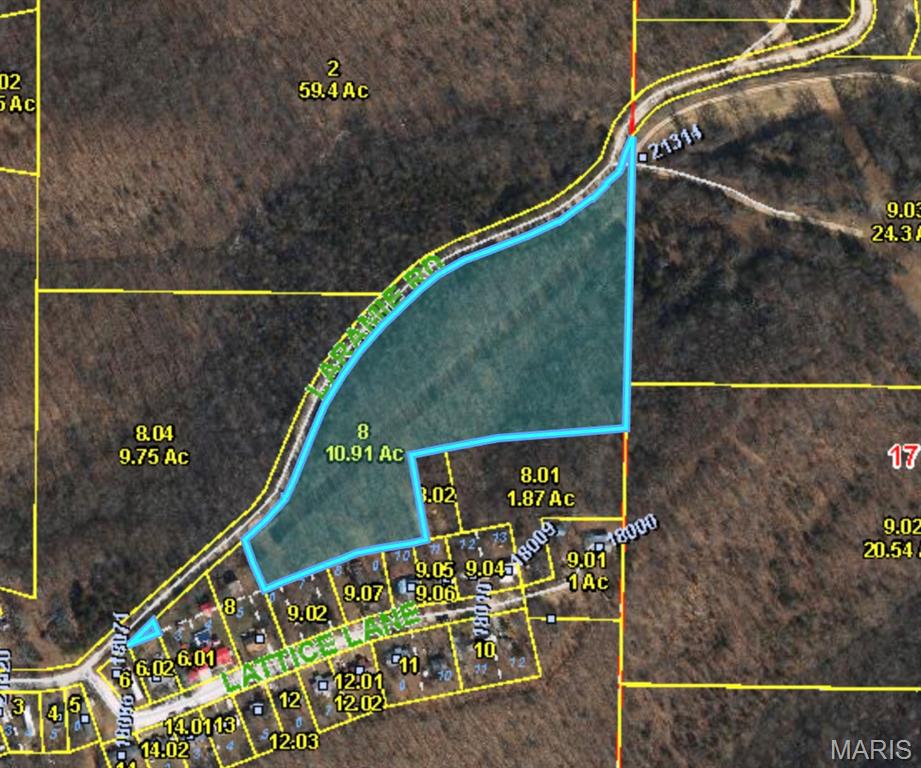10.91 +/- acres located in Pulaski County, Missouri. This property is a haven of natural beauty, offering the perfect setting at the top of the hill for a home site or a private retreat for outdoor adventures. The front of this property near Laramie Rd is a steep slope, however, at the top of the hill, the land levels out. Electrical utilities are already in place & the poles run directly through the middle of the property. Enjoy the convince of traveling to St. Robert Missouri or Fort Leonard Wood Army Base within minutes!