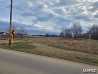 Commercial Land for Sale!  11 Acres m/l is available for you to build your own building.  This is located behind the Bowling Alley and behind Wal-Mart with road frontage on Arvin Road.