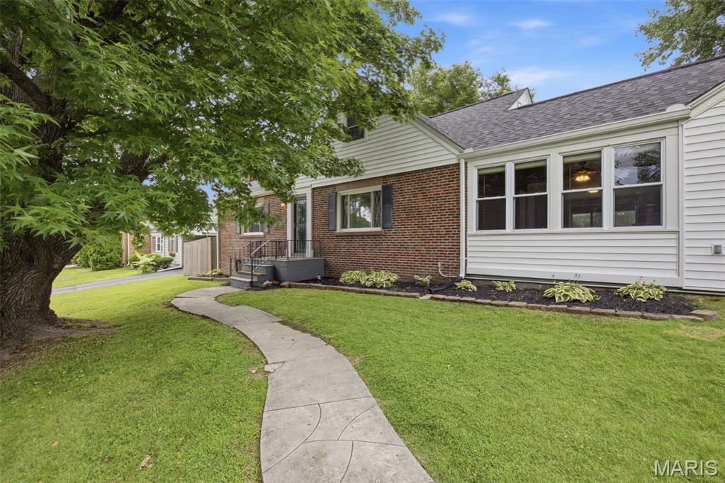 Welcome to 9860 Berwick Drive, where classic character meets modern updates.
Step inside to find beautiful hardwood floors, a spacious living room anchored by a stunning stone fireplace, and a formal dining room filled with charm and architectural detail.
The updated kitchen features white cabinetry, stainless steel appliances, and plenty of space for gathering with family and friends.
One of the home’s standout features is the bright four-season room overlooking the spacious, level backyard, creating the perfect place to relax year-round.
Upstairs you’ll discover an incredible owner’s retreat complete with a large bedroom, spa-inspired bathroom with oversized glass shower, and a remarkable walk-in dressing room and closet area rarely found in homes at this price point.
Outside, you’ll appreciate the level yard, ideal for entertaining, kids, pets, or future outdoor projects. The attached two-car garage provides convenience and extra storage that buyers are always looking for.
Offering nearly 1,800 square feet of living space and priced at $349,900, this Affton gem combines character, functionality, and value.
Schedule your private showing today before it’s gone.”