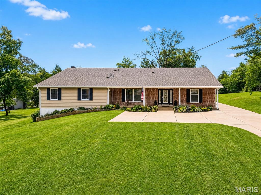 Recently appraised at $875,000. Seller is offering generous closing cost assistance and a comprehensive 2-year home warranty, providing both immediate savings and long-term peace of mind for the next owner.  
Welcome to this stunning custom ranch estate tucked away on nearly 3 flat, usable acres in the Private Fon-Du-Lac subdivision, offering lake access and partial lake views just minutes from the heart of Fenton. Boasting over 5,800 sq ft with an exceptional 4,100 sq ft of main floor living space, this extensively updated 5-bedroom, 4-bath home blends luxury design with everyday comfort and functionality. From the moment you enter, you’ll notice the brand-new LVP flooring, upgraded designer lighting, and thoughtfully designed open spaces ideal for both entertaining and daily living. The fully renovated kitchen serves as the centerpiece of the home featuring quartz countertops, custom soft-close cabinetry, dual pantries, Whirlpool appliance package, professional-style sink and prep station, beverage cooler with separate temperature zones, custom smoked glass accents, and a pass-through cocktail window connecting seamlessly to the outdoor entertaining area. The spacious main level offers two separate living areas along with an oversized rec/game room complete with a built-in bar. Retreat to the completely redesigned primary suite featuring a spa-inspired bath with soaking tub, Bluetooth-enabled bathrooms with recessed infrared heat lamps, adjustable lighted mirrors, dual 6x6 walk-in closets, and dedicated vanity station. Additional highlights include a massive laundry room with custom cabinetry and salon-style pet wash station, partially finished lower level with blackout ceiling design, remote-control ceiling fans throughout, raised garden with electric fencing, RV parking with electric and water hookups, oversized 3+ car garage with custom storage, 24-hour digital security system with remote access, silent belt-drive garage doors, freshly sealed driveway, and so much more! Rarely does a property combine this level of updated luxury, usable acreage, recreational space, and Private lake-community living in such a prime location.