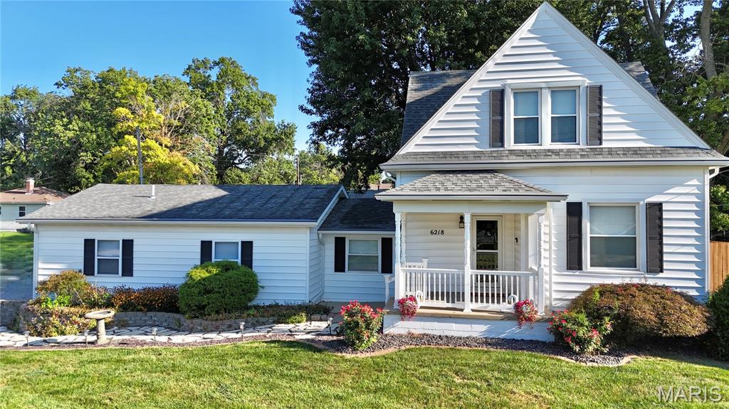 Welcome to your ideal move-in ready retreat in the heart of Maryville! This charming 1.5-story home blends crucial major updates with an unbeatable outdoor entertaining setup, making it a standout option on the market. Privacy fenced yard w/ Pool, deck, patio. Beautiful Landscaping. 
Interior Highlights
Main Level Living: An inviting, light-filled layout features a kitchen seamlessly open to the dining area—perfect for hosting and daily connection.
Updated Kitchen: Finished with sleek granite countertops, stainless steel appliances, and plenty of workspace.
Bedrooms & Baths: Features 3 bedrooms and 2 full bathrooms, including a retreat-style bathroom outfitted with a corner shower and a relaxing jet tub.
Bonus Space: An unfinished basement offers endless potential for custom finishing, a home gym, or extensive extra storage.
Included: All kitchen appliances plus the washer and dryer stay with the home!
Outdoor & Entertainment Oasis
Screened-In Porch: Relax bug-free while overlooking your private backyard setup.
Pool & Decks: Step out onto two attached decks surrounding an above-ground pool—ready for summer fun and poolside lounging.
Backyard: Fully fenced yard with beautiful landscaping and a large mature shade tree providing natural relief on sunny days.
Porches & Patios: Enjoy a classic covered front porch for morning coffee and an additional patio off the garage service door.
Garage & Systems
Oversized Side-Entry Garage: Offers ample vehicle parking, extra storage space, and a convenient side access door.
Upgraded Major Systems for Peace of Mind:
Water Heater: Brand new (2026)
Furnace & Air Conditioner: Updated (2024)
Roof: Replaced (2018)
Situated in a highly convenient Maryville location close to local amenities, schools, and highway access, this house is completely ready for its new owners to move right in and enjoy. Schedule your tour today!