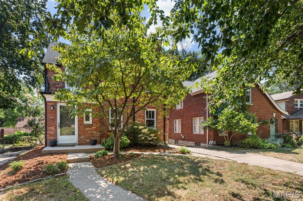 Welcome to 7418 Stanford Avenue! This charming brick home is filled with warmth and character, featuring beautiful wood floors, arched doorways, and an abundance of natural light throughout.
The first floor offers a lovely bonus room at the back of the home—perfect for a home office, child’s playroom, or craft room—along with a conveniently located half bath. Upstairs, you’ll find three bedrooms and two full baths, including a gorgeous primary suite with a private balcony off the primary bath. There’s plenty of parking, with a driveway leading to the garage and backyard. And, of course, you can’t beat the fantastic University City location, close to everything this vibrant community has to offer. Prepare to fall in love with 7418 Stanford Avenue. Schedule your showing today!
