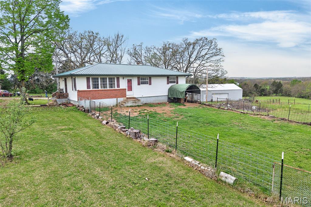 Beautiful 10+/- acre property featuring a 3 bedroom, 1 bathroom ranch-style home with an unfinished basement and a 1,200 sq ft detached garage. The home offers approximately 1,152 sq ft with a functional layout and plenty of opportunity to update and add value.

The land is the real highlight—mostly open pasture with scattered trees, a pond, and excellent usable ground. Ideal for a hobby farm, animals, or simply enjoying space and privacy.

Conveniently located just off State Highway 7 for easy access, while still offering a quiet country setting. The large detached garage provides great space for storage, a workshop, or equipment.

Seller is offering $5k flooring allowance with accepted contract.

If you’ve been searching for acreage with a home already in place and room to grow, this property offers a ton of potential.