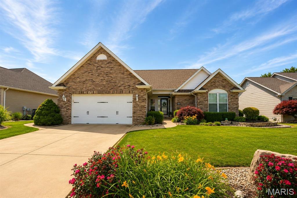 The waiting is over! Pristine and meticulously maintained home now available in the prestigious Savannah Trace neighborhood! The landscaped entry welcomes you into the the foyer entry of this beautiful home! Open floor-plan from the living, dining, and kitchen areas. Gas fireplace warms the living area. Luxurious features of arches, columns, and vaulted ceilings flow through the living spaces. Formal dining, cozy nook, and breakfast bar provide a variety of dining settings. The main floor walks out to the backyard deck. Private Primary Bedroom Suite offers a spacious resting place and private bathroom with a separate tub and shower, dual vanity, and walk-in closet. 2 additional bedrooms, a full bathroom, and the main floor laundry complete the main level. Step down to a full basement offering a family room, bonus room, full bathroom, and tons of storage area with shelving and lighting. The basement walks out to a concrete patio area. Two car attached garage and exterior undergound sprinkler system complete this listing. Roof - 2023. HVAC - 2018. Water Heater - 2014. All MLS info to be verified by buyer.