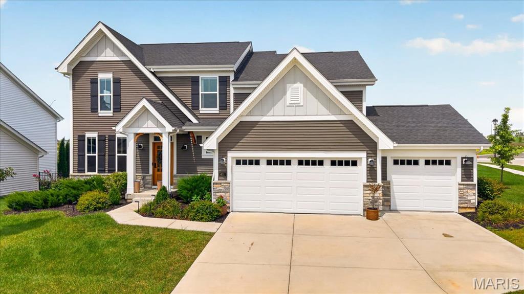 Welcome to 401 Burnley Drive, a beautifully designed home in the sought-after Streets of Caledonia community offering 4 bedrooms, 2 full and 2 half baths, a 3-car garage, and approximately 3,394 square feet of living space. Built in 2022, this home combines a fresh, modern feel with spacious rooms and a thoughtfully designed floor plan made for both everyday living and entertaining. From the moment you step inside, you'll appreciate the bright, open atmosphere, stylish finishes, and abundant natural light throughout. The main living area makes an immediate impression with soaring ceilings, an impressive wall of windows overlooking the backyard, and an open layout that seamlessly connects the living, dining, and kitchen spaces. Luxury vinyl plank flooring flows throughout much of the main level, creating a cohesive and contemporary look. At the heart of the home is the spacious kitchen featuring an oversized contrasting center island with seating, abundant cabinetry, generous counter space, stainless steel appliances, and recessed lighting. The open design allows the kitchen to flow effortlessly into the breakfast and living areas, making it ideal for hosting family and friends. A separate dining space provides additional room for gatherings, while a dedicated office offers the perfect work-from-home setup. Additional functional spaces, including a drop zone and pantry area, provide plenty of everyday organization and storage. Upstairs, you'll find all four bedrooms, including a spacious primary suite designed to feel like a private retreat. The primary bedroom offers plenty of room for a sitting area, while the ensuite bath features a large dual-sink vanity, oversized mirrors, a walk-in shower, and stylish finishes. Three additional bedrooms, another full bath, and a conveniently located laundry room complete the upper level. The finished lower level expands the home's living and entertaining possibilities with an expansive recreation area offering plenty of space for a home theater, game room, pool table, fitness area, or additional gathering space. A convenient half bath adds even more functionality. Outside, enjoy a large, level backyard with plenty of room to play, entertain, garden, or simply relax. The patio provides the perfect spot for outdoor dining and summer evenings, while the open green space beyond creates an inviting backdrop. An attached 3-car garage provides excellent parking and additional storage. Located in Streets of Caledonia, residents have access to an impressive collection of neighborhood amenities, including a clubhouse, community pool, playground, park, picnic areas, tennis courts, game courts, and walking trails. With its spacious layout, modern finishes, flexible living spaces, and fantastic community amenities, 401 Burnley Drive offers the space and lifestyle you've been looking for in O'Fallon!