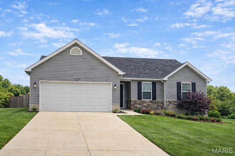 Welcome to 1627 Saint Charles Dr., a charming and well-kept ranch style home offering comfort, style, and thoughtful updates throughout. This 4-bedroom, 2-bath home features an inviting open floor layout and a finished lower level that expands your living space to include a spacious family room, fourth bedroom and an exercise room.  All with newer luxury laminate flooring and recessed lighting. Perfect for guests and expanded living space with a rough-in for additional bath.   Bright, open main level with spacious living areas. All kitchen appliances are newer Samsung appliances and are staying with the home including a newer high-end refrigerator. Newer lighting, ceiling fan, new front entry door, lower-level laminate flooring and fresh interior paint are just a few improvements. Large Privacy-fenced backyard with double gate. ideal for relaxing or entertaining. Fire pit stays with the home for cozy evenings outdoors. Well-manicured lawn and tasteful landscaping add curb appeal. This home blends modern convenience with inviting warmth — move-in ready and designed for easy living.