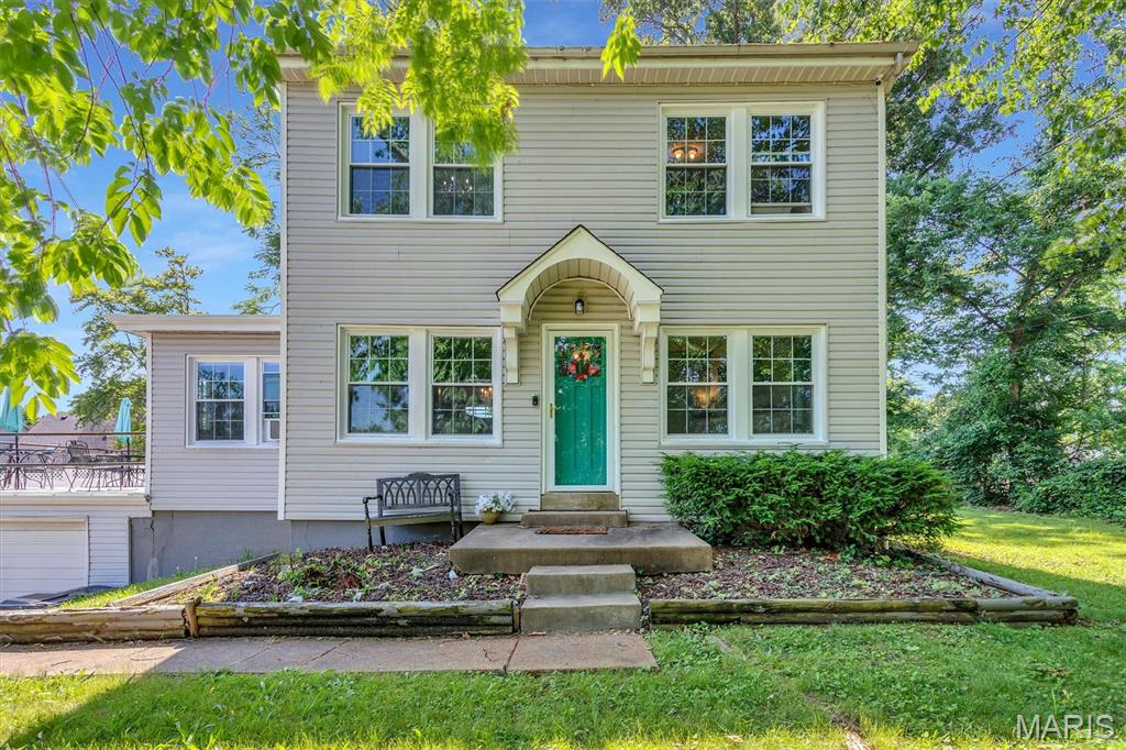 Price adjustment.  The seller is motivated to consider any reasonable offer.  This is a GREAT opportunity for a home buyer willing to put in some sweat equity or for investor to add to their portfolio!  This 98-year-old two-story home offers tremendous potential.  This home is filled with character and charm!  Situated on a semi-private .32-acre lot with no HOA restrictions, this property blends historic features with several updates already in place. The home offers an updated kitchen and bathroom, newer vinyl windows, some updated plumbing, and convenient main-floor laundry. Original architectural details include a beautiful stained-glass window in the living room, a wood-burning fireplace, original doors, hardware and baseboards.  Enjoy entertaining outdoors on the covered rear porch overlooking the spacious backyard. Exterior security cameras are included in the sale, and the refrigerator, washer, and dryer are negotiable. Located within the highly desirable Oakville School District and just minutes from shopping, dining, and interstates.  Please refer to the list of supplements provided by the sellers. This property presents a unique opportunity for the right buyer to build equity.   This being sold in its current as-is condition. Call today for an exclusive showing.