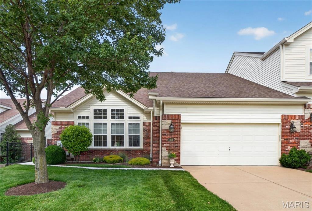 Extraordinary One-Story Lake Front Villa offers a serene setting overlooking picturesque views of the lake & fountain! This brick & stone lakefront villa is located on "A Premium Cul-de-Sac Walkout Lot" & is located behind security gates, plus offers over 2800 sq. ft. of Sophisticated Detailing & Appointments including beautiful, upgraded Wood floors, Custom wood moldings throughout & Architectural columns. The impressive foyer overlooks the spacious living room with the inverted vaulted ceiling & a two-story wall of expansive windows. Stunning great room w/ gas fireplace. built-in bookcases & custom moldings, offers a wall of glass with spectacular views of the Lighted Fountain in the evening!! Designer kitchen w/ 42" Custom Cabinets, large center island, premium appliances, Mullen cabinet including the refrigerator overlooks the Sun- Lit Breakfast Room. The Sunroom is impressive with its walls of windows w/ breathtaking views of the backyard. Primary Bedroom w/ coffered ceiling & extensive moldings is a welcome retreat overlooking the Luxury Bath with large walk-in shower w/ seat, plus a tub! Welcome to the walkout lower level with a bedroom, full bath, recreation rm, family rm, w/wet bar with large windows and a door leading to the patio for entertaining. Other upgrades include a nice flat yard with gorgeous views, Deck with newer railing & awning for those hot days. Refrigerator in Laundry Room, Washer, Dryer & Refrigerator in kitchen stays. Available for a Quick Closing!