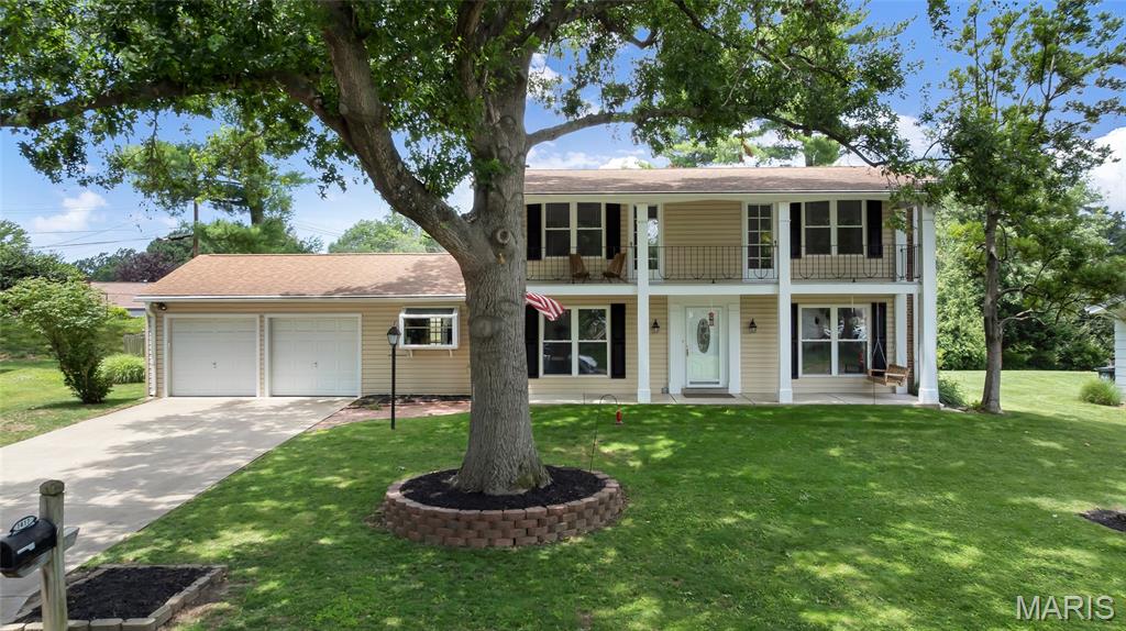 Welcome home to this beautifully updated 5-bedroom, 3-bath, two-story home situated on a spacious level lot. The inviting family room features a refinished fireplace with gas logs, creating the perfect gathering space, while the sun-filled Four-Season Room offers a bright retreat to enjoy year-round.
The renovated kitchen is the heart of the home, showcasing new butcher block countertops, subway tile backsplash, sleek black hardware, stainless steel appliances, a new stainless steel hood fan, dishwasher, and updated lighting. Additional interior improvements include fresh paint, replaced interior doors, new flooring in the kitchen, bathrooms, and entryway, updated bathroom vanities, new ceiling fans & lighting throughout, and a freshly painted basement.
The main-level primary suite provides comfort & privacy, while four additional bedrooms upstairs offer plenty of space for family, guests, or a home office.
Outside, you'll appreciate the new shutters and freshly painted exterior, adding to the home's curb appeal. With extensive updates already completed, this move-in-ready home blends classic charm with modern style and functionality throughout.