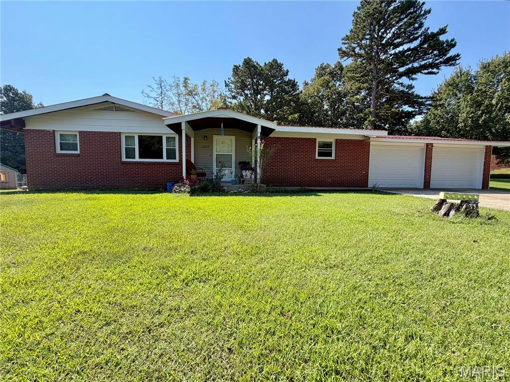 Charming 3-bedroom, 2-bath home sitting pretty in a quiet neighborhood surrounded by abundant wildlife and natural beauty. This inviting home features new flooring, fresh paint, and new appliances, totally move-in-ready. Enjoy cozy evenings by the wood-burning fireplace, and appreciate the added peace of mind of a wired-in gas generator, that stays with the home.  A third bay garage adds tons of extra storage.  This home is a must see.