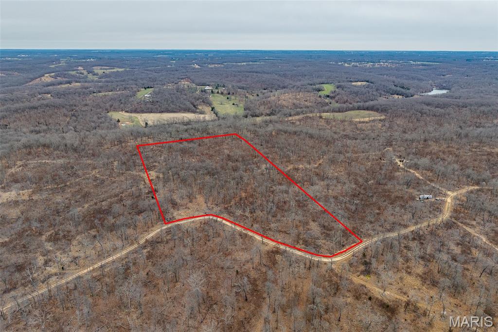 23.03 wooded acres offering the perfect blend of seclusion and opportunity! Whether you’re searching for a private hunting retreat or the ideal setting to build your dream home, this property delivers. Featuring mature timber and abundant wildlife, it’s a haven for outdoor enthusiasts. Enjoy peace and privacy while still having plenty of space to create trails, a cabin, or your forever home. Don’t miss your chance to own this versatile piece of land with endless potential!