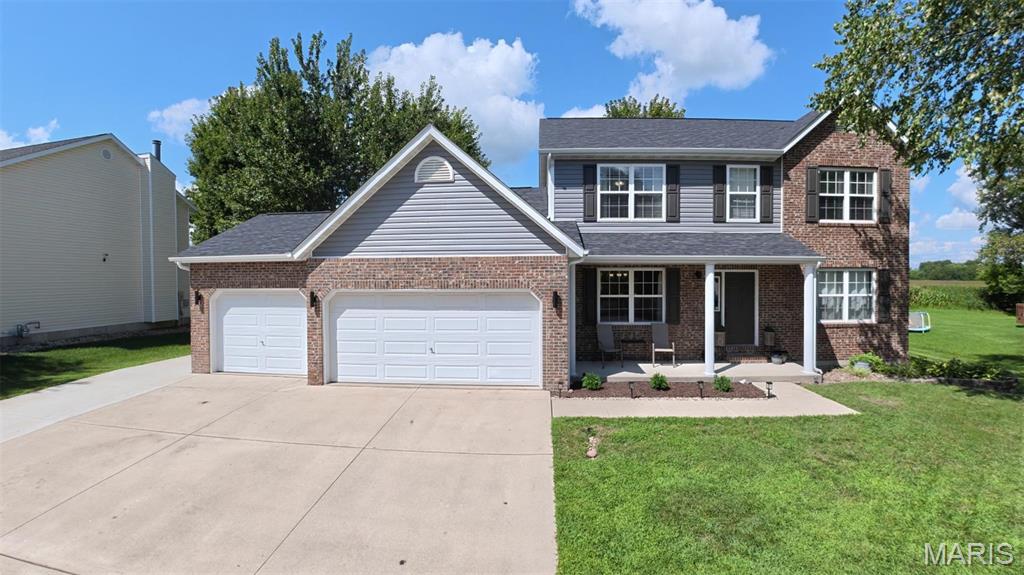Welcome to 1122 Buran Drive, an expansive two-story home offering over 2,800 finished square feet near the end of a quiet, dead-end street and just a few blocks from Moye Elementary School! Updated landscaping enhances the curb appeal, while a recently added driveway extension provides additional parking and convenient space for a camper or trailer without obstructing the three-car garage.

Inside, the main level features an updated kitchen with stone countertops, a center island, and a complete suite of Samsung black stainless smart appliances. Highlights include a counter-depth refrigerator with touchscreen Smart Hub, gas range with Flex Duo™ and Air Fry, over-the-range microwave with sensor cooking, and Smart Linear Wash dishwasher. A large walk-in pantry and spacious main-floor laundry room provide excellent everyday storage and convenience. The main level also includes a formal dining room, family room, and a highly desirable primary suite.

The primary suite offers an oversized walk-in closet and a spacious en-suite bathroom with a separate soaking tub and shower, dual-sink vanity, and new backlit vanity mirrors. Upstairs, you will find three additional bedrooms, a full bathroom, and a huge family room with vaulted ceilings—perfect for entertaining, relaxing, working from home, or creating a game room.

The unfinished basement features ceilings over nine feet tall, an already finished full bathroom, and an egress window, providing outstanding potential for a future bedroom and approximately 1,000 additional square feet of finished living space.

Outside, the fenced backyard backs to cornfields for added privacy and features a black aluminum fence and a large patio with pergola added in 2024. Major improvements include a new roof installed in 2026 with upgraded Class 4 impact-resistant shingles, along with HVAC and water heater replacements completed in 2021. With generous living space, valuable updates, a three-car garage, and room to grow, this impressive home is ready for its next owner!