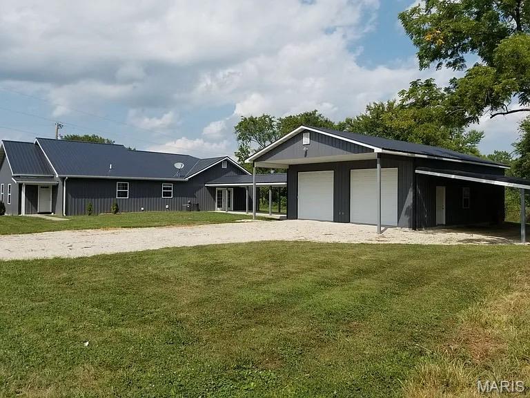 Rare opportunity to own a spacious single level ranch style home in town on 1.24 acres offering the perfect combination of space, functionality, and entertaining potential! This spacious 3 bedroom, 2 bathroom home features plenty of room both inside and out. Connected to the oversized 30’ x 40’ shop by a large 36’ x 12’ lighted breezeway, the shop boasts impressive 12’ ceilings, two 10’ x 10’ garage doors, and an additional 16’ x 40’ lean-to, providing endless space for vehicles, storage, hobbies, or a workshop setup.
Inside, you’ll love the massive 680 sq. ft. living/family room complete with a beautiful built-in bar, making it the perfect space for entertaining guests, hosting game nights, or gathering with family and friends.
With spacious living areas, incredible garage/workshop space, and a rare in-town acreage setting, this property offers comfort, convenience, and endless possibilities.