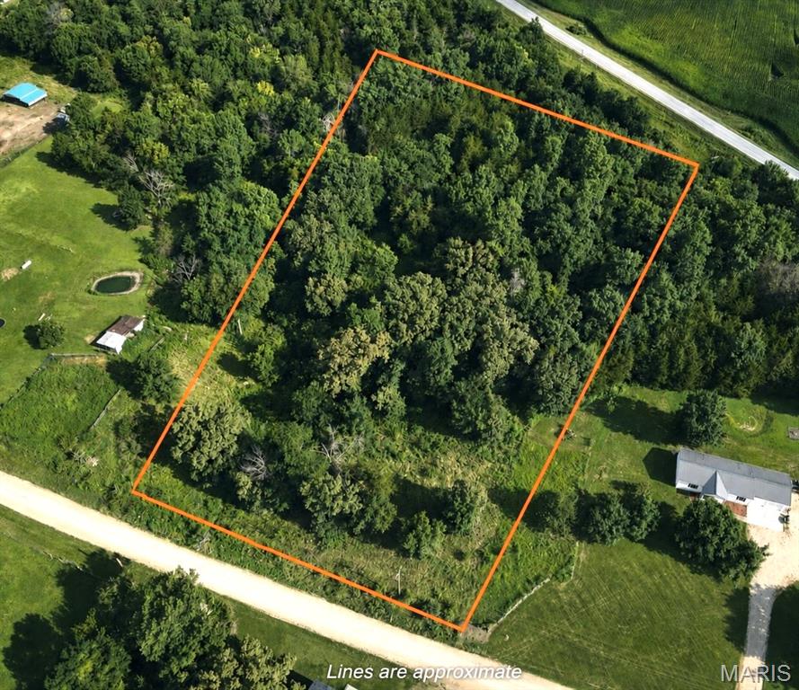 Discover the perfect blend of privacy, convenience, and opportunity with this beautiful 3.7± acre wooded property located at 250th Ave., Lewistown, MO. Tucked away just a short distance off the highway, this peaceful setting offers the seclusion you’ve been searching for without sacrificing easy access to nearby amenities.

Surrounded by mature timber, this property provides an ideal backdrop for your dream home, weekend retreat, or future investment. Whether you envision a custom home nestled beneath the trees, a cozy cabin getaway, or simply a place to enjoy the outdoors, the possibilities are endless.

Families will appreciate the property’s location just minutes from Highland Schools, while commuters will love the quick access to major roadways. Enjoy the beauty of country living with abundant wildlife, natural scenery, and the tranquility that only a wooded acreage can provide.

Don’t miss this rare opportunity to own a build-ready piece of Northeast Missouri where privacy, location, and potential come together. Bring your vision and make this stunning 3.7-acre property your own!