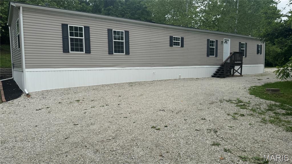 Back on market no fault of seller. Well maintained 2008 Fleetwood manufactured home situated on 1.69 beautiful acres. Mobile home is 16' wide, and 80 'long. This spacious home has been extensively updated and offers the feel of a traditional residence with generous living space.  The property is titled and taxed as real estate.  Buyer's are encouraged to verify financing options with their lender prior to submitting an offer, as lending guidelines for manufactured homes vary by institution.  Buyers should consult a lender experienced in manufactured home financing to verify loan eligibility. Trailer is attached to the ground with augered earth anchors and framed tie-downs and is not on a permanent foundation.

Take a look at this home on over 1.69 acres. All the hard work has already been done for you! Looking for space, privacy, and endless potential? Here it is.
This charming home features 3 bedrooms, 2 bathrooms, a semi-open layout, and over 1,200 finished square feet. An abundance of windows fills the home with natural light, giving each space a warm, inviting feel. The cozy kitchen offers a fabulous layout with multiple areas to prepare and enjoy that special meal.

Loaded with updates and upgrades, this one is a must-see! Recent improvements include a new architectural roof in 2025, new well in 2024, new pressure tank, new gutters, new front door, fresh paint throughout, and new skirting. Luxury vinyl plank flooring stretches through the main living areas, complemented by new colonial 5 1/4" baseboards. Much more!

The private primary suite feels like its own escape, featuring a large walk-in closet, oversized garden tub, and separate shower — perfect for unwinding at the end of the day. Property offers a convenient St. Clair location in a country setting!

A rare blend of privacy, usable green space, and character. If you’ve been wanting a little bit of land, schedule your showing today!