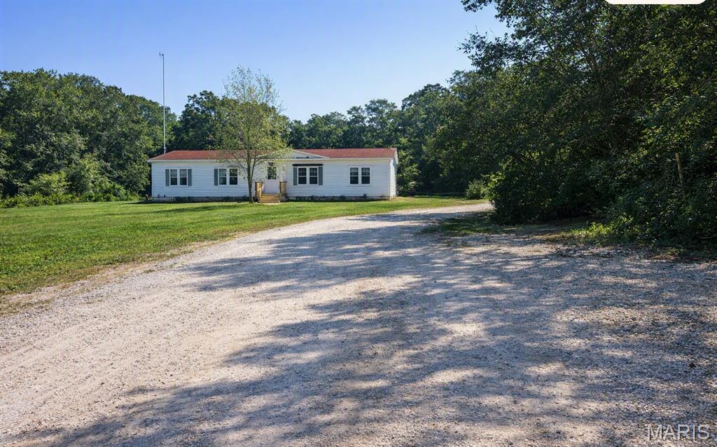 Very Nice 1620 Sq Ft home Spacious Rooms sitting on 2.9 acres with a large fenced yard,30x26 out building.Would be great for cars,workshop or many other uses has two covered additions on each side and another storage area on the back plus a loft for more storage.Sits at the end of the culdesac. Great lot, Lots of room to run. Yard is very large, completely fenced with three gates and another acre or more with a play house or to watch wildlife.Home has large living room,nice dining room,big kitchen and nice size family room with a wood burning stove. Great views of the acreage in back. Primary bedroom is nice size with primary bathroom with tiled shower with twin shower heads,and a large walk-in closet. Home also features 2 smaller bedrooms, office area, another full bath and large laundry area. Conveniently located 20 to 25 minutes from Washington,Warrenton, and Highway 70. This property won't last long. Make appointment Quickly.THIS PROPERTY IS HUD OWNED.IT IS BEING SOLD IN AS-IS CONDITION.FIRST DAYS ON THE MARKET OR FOR OCCUPANT ONLY,NON PROFIT ORGANIZATIONS,AND GOVERMENT AGENCIES ONLY.CASE NUMBER 292-785601 GO TO WWW.HUDHOMESTORE.GOV TO SUBMIT ALL OFFERS.UTILITIES ARE TURNED OFF BRING FLASHES LIGHTS IF NEEDED FOR ALL SHOWINGS AND USE CAUTION WHEN SHOWING WWW.OLYMPUSAMS-AT.COM   NOT FHA INSURABLE
