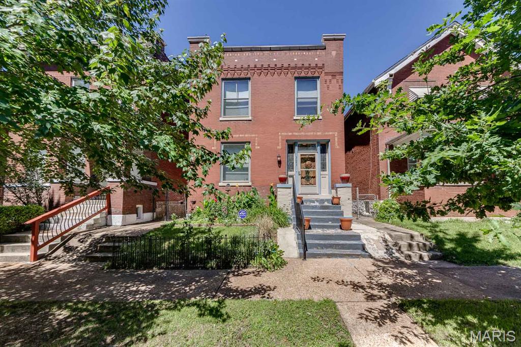 Welcome to 3643 Minnesota in the heart of the "up and coming" Gravois Park neighborhood. This 4 bedroom and 2 1/2 bath home is  waiting for a new owner. Lovingly cared for and consistently maintained and full of light, this is truly move in ready. You are greeted by the perennial gardens before you even enter. Believe it or not the original staircase remains as does the beautiful stain glass on the landing and in the dining room. The decorative fireplace with lovely mantle has the cutest electric fire logs. The beamed ceiling in the dining room offers historic accent,  as does the original millwork throughout The fully equipped kitchen includes a breakfast bar and all appliances. The rear sunroom is the perfect place for morning coffee.  The 1/2 bath rounds out the 1st floor.  The upper level offers 4 bedrooms. One is being used as an office and another is being used as a sitting room. Updated bath and plenty of closet space too.  On the lower level, find a partially finished "rec" room, full bath, laundry room (washer & dryer stay) and mud room with access to the outside. The back yard is a quiet haven for relaxing and enjoy more perennials.  The 2-car garage with double doors is a huge plus.  You are close to Cherokee street, shopping and community gardens.  The clear St. Louis City Occupancy and 2 years of a Choice Home Warranty make this lovely home perfect for you and your family!