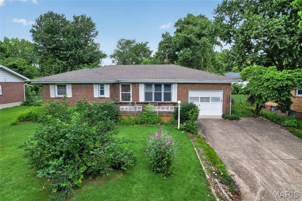 VA Loan Eligible. No Flood Zone. SOLD AS IS. Opportunity awaits! If you've been looking for a home in a great location with a functional floor plan and room to build equity, this is it! While a few cosmetic updates could modernize the space, this home is move-in ready as it sits, allowing you to update at your own pace or take on a full renovation. Located in the highly sought-after Waynesville School District, just minutes from downtown Waynesville and Fort Leonard Wood, this home is priced to sell and offers endless potential for its next owner.
Step inside to find a welcoming living room that flows into the dining area and kitchen. All three bedrooms are conveniently located on the same side of the home, along with a full guest bathroom featuring a tub/shower combination and a primary suite with its own half bath. Just off the back of the home, the spacious add-on room provides the perfect place to relax, entertain, or enjoy additional living space year-round.
Downstairs, the oversized cellar-style basement offers exceptional storage and endless possibilities. Whether you envision a workshop, hobby space, finished family room, or the addition of a third bathroom, there's plenty of room to make it your own.
Whether you are a first-time buyer, an investor, or someone looking for a home to personalize over time, this property is full of opportunity. Bring your vision and unlock the potential this home has to offer!