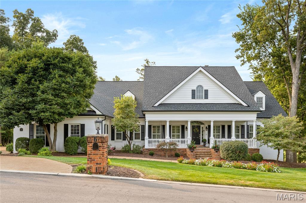 Picture Perfect Colonial in prestigious Whitmoor Country Club. This full-brick J L Wise-built great room ranch features sophisticated interior detailing & appointments throughout including oak hardwoods, 10’ ceilings, custom trim work accents & plantation shutters. Impressive foyer leads to formal dining room and stunning great room with tiled fireplace flanked by mirrored display cases, pass-through wet bar & soaring windows that overlook the 10th hole on the South course. Chef’s kitchen with 42” white cabinetry, granite countertops, stainless steel appliances & 5’ center island adjoins light-filled breakfast room & hearth room with floor-to-ceiling brick fireplace. Vaulted primary bedroom suite with sitting room & luxury bath with jetted tub offers an appealing retreat. Walk-out Lower Level includes recreation room with fireplace & wet bar & family room with built-in bookcases plus 3 additional bedrooms & 2 full baths. Situated on a .6-acre cul-de-sac lot with 2 decks & 3-car garage