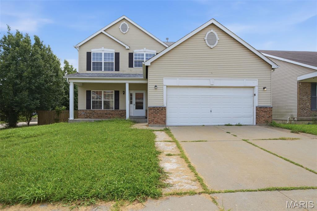 Discover this spacious 2-story home featuring 4 bedrooms, 2.5 bathrooms, and a 2-car garage with a layout designed for comfortable living and entertaining. A welcoming front porch and inviting foyer set the tone as you enter. The living room features a cozy fireplace, while the formal dining room is perfect for gatherings. The kitchen offers an island for added workspace and flows into the main living areas. Upstairs you'll find all four bedrooms, including a spacious primary suite with a double vanity and jetted tub, along with an additional living area that provides flexible space for a media room, playroom, or home office. A separate laundry room adds everyday convenience. Step outside to enjoy the wood deck overlooking the wood-fenced backyard, perfect for relaxing or entertaining. One or more photos may have been virtually staged, AI generated, or digitally enhanced to illustrate the property's potential.