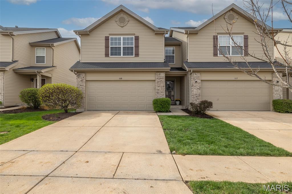 Welcome to this well-maintained townhome in a prime Lake St. Louis location. Just minutes from shopping, dining, schools, and parks, all within a fantastic neighborhood setting. Enjoy access to community amenities including a pool, basketball court, tennis court, and sidewalks throughout. Most exterior maintenance is included, allowing you to spend less time on upkeep and more time enjoying your home. HOA dues are $210 per month along with a $475 annual assessment for subdivision amenities. Step inside to a spacious, open living and dining area. The inviting gas fireplace enhances the space and is a feature not offered in every unit. Generous windows brighten the space and create an open, airy feel. The kitchen offers granite countertops, stainless steel appliances, and a convenient breakfast bar. The powder room on the main level adds convenience. Upstairs features three bedrooms and two full bathrooms. Convenient second-floor laundry makes life easier. The spacious primary suite offers a flexible sitting area that works well for a reading nook, home office, or workout space. The private bath has a tub and separate shower plus a large walk in closet. Two additional bedrooms provide great space for family, guests, or office use. The finished lower level adds even more living space, complete with a projector and screen that make it ideal for movie nights or gaming. Additional highlights include a two-car garage, a concrete patio for outdoor enjoyment, and ample storage throughout. This home has been thoughtfully cared for and is ready for its next owner to move in and enjoy. Don’t miss this opportunity!