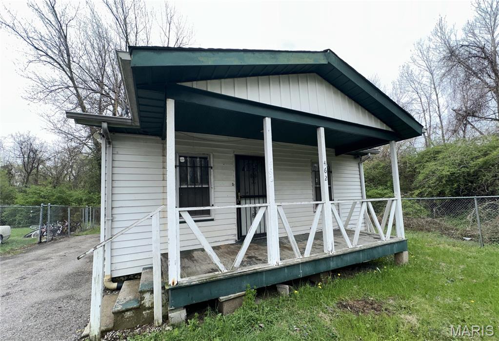 Private location and fenced yard. This bungalow located on fairly level lot with a detached garage. Special features include fenced yard, detached two garage.