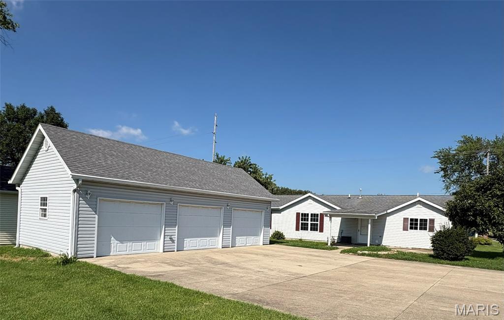 Well-maintained, clean, and move-in ready, this 3-bedroom, 1.5-bath home offers comfortable living with generous-sized rooms and ceiling fans throughout. Built on a slab foundation for easy maintenance, the home features an eat-in kitchen with a pantry, and all kitchen appliances are included. Laundry hookups are available in both the kitchen and the half bath, offering flexibility to suit your needs. Just outside the back door, you’ll find a covered patio that’s perfect for relaxing or entertaining. A standout feature is the large detached 3-car garage, along with abundant off-street parking. Formerly used as an office, the property includes a spacious front parking lot in addition to a rear parking pad and garage, providing exceptional parking and flexibility for a variety of uses. Conveniently located with quick access to Interstate 255, this property combines comfort, functionality, and an excellent location.