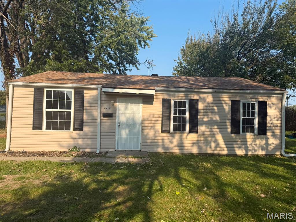CALLING ALL INVESTORS!! Featuring three bedrooms and one bathroom, this home offers a bright and airy living room with large windows that flood the space with sunlight. The kitchen is perfectly sized, complete with ample cabinet storage. Enjoy a spacious front lawn and a manageable backyard, ideal for your vision.  The home is being sold as-is, with the seller making no repairs. Don’t miss out on this opportunity!
