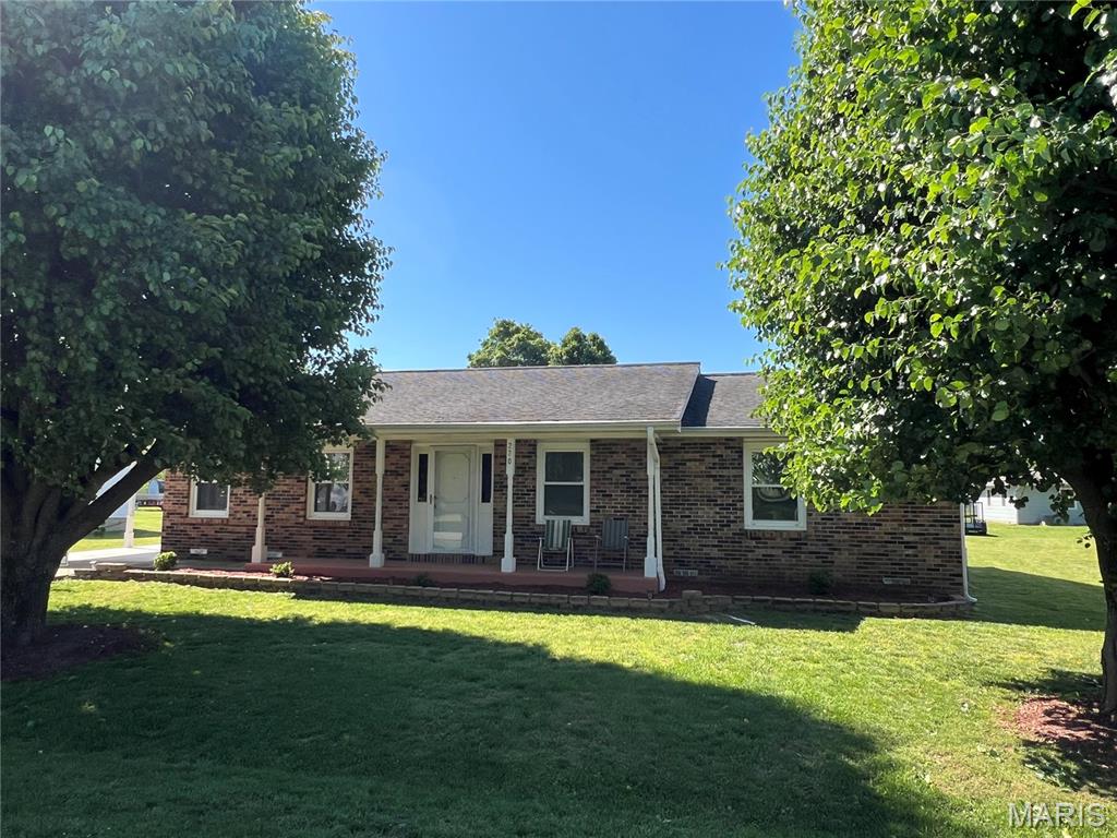 Comfortable, clean and cozy, describes this home, located on a dead-end street in a quiet neighborhood. Ranch style home with brick and vinyl exterior, attached carport and covered front porch, for enjoying time outside. Level back yard and storage shed. House has fresh paint throughout and some new flooring. Large entry way with plenty of space and storage. Roomy living room, kitchen with snack bar and all appliances, separate dining room with built-in corner cabinet, three bedrooms, 1-1/2-baths and laundry room. Home has central heat and air. Don't miss out on this ready to move in home in a great neighborhood.