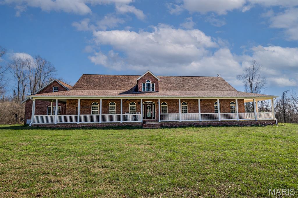 Private, spacious home on 5+ acres in Benton! This over 5,000 sq. ft. property features 4 bedrooms, 4 bathrooms, multiple living spaces, and a 3-car garage. Enjoy the peaceful setting from the wraparound porch while surrounded by mature trees and privacy. With plenty of room inside and out, this property offers the perfect blend of space, seclusion, and comfort just minutes from town.