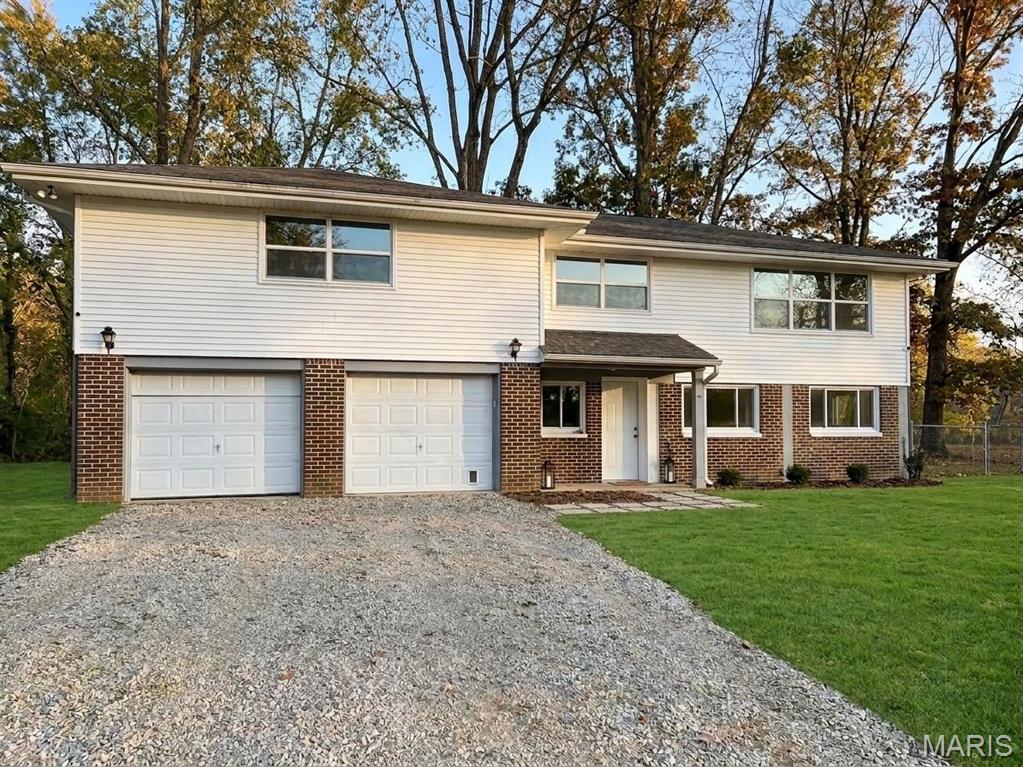 Discover the perfect blend of modern luxury and rural serenity at 7942 Riverview Dr. Tucked away in the quiet, scenic hills of Dittmer, this beautifully updated 3-bedroom, 1.5-bath home offers a true "turn-key" experience. Every inch has been thoughtfully improved, ensuring you can move in and immediately start enjoying the peaceful surroundings of the Big River valley.Interior HighlightsStep inside to a fresh, modern atmosphere where no detail has been overlooked. The heart of the home is the fully remodeled kitchen, now boasting brand-new cabinets, sparkling countertops, contemporary appliances, and durable new flooring—perfect for both daily meals and entertaining.The main level shines with new flooring throughout and is flooded with natural light from all-new windows, ensuring energy efficiency and a bright, airy feel. Comfort is guaranteed year-round with a brand-new air conditioning unit and stylish new ceiling fans with adjustable speeds and lighting in every room. Both bathrooms have been tastefully remodeled, offering spa-like retreats with modern fixtures.Finished Lower LevelThe walk-out lower level has been transformed into a versatile bonus space. Featuring a finished drop ceiling, sturdy cement wallboard, and fresh paint throughout, this area is a blank canvas ready for your home theater, recreation room, or home office.Systems & ExteriorPeace of mind comes standard here. Beyond the cosmetic upgrades, the home features all-new PVC plumbing throughout. The property sits on a spacious, gently sloping lot (approx. 0.72 acres) with mature trees, offering plenty of room for gardening, play, or relaxing on the deck.LocationLocated within the Grandview R-II School District, this home offers a quiet escape just minutes from local conveniences. Enjoy weekends exploring the nearby Big River, fishing at Lake Kirchener, or visiting the historic Sandy Creek Covered Bridge. You are less than 30 minutes from the amenities of Fenton and St. Louis, giving you the best of country living with city access.Don't miss this beautifully restored home—schedule your private showing today!