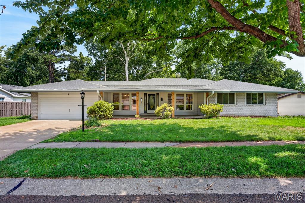Beautifully remodeled and truly move-in ready, this ranch in highly desirable Old Farm Estates offers over 3,100 square feet of finished living space, blending modern updates with a functional floor plan designed for everyday living. Brand-new luxury vinyl plank flooring flows throughout the main level, while oversized windows in the living room, family room, and formal dining room fill the home with abundant natural light, creating a bright and welcoming atmosphere.

The spacious living room, accented with elegant chair rail detailing, and separate family room provide multiple gathering spaces for entertaining or relaxing. The formal dining room is ideal for holidays and special occasions, while the updated kitchen is sure to impress with a large eat-in island, custom backsplash, abundant cabinetry, and generous storage.

The oversized main-floor laundry / mudroom adds exceptional convenience and provides direct access to the backyard and concrete patio—perfect for unloading groceries, pets, or enjoying seamless indoor-outdoor living.

The private primary suite serves as a relaxing retreat, complete with a walk-in closet featuring custom built-ins and a beautifully updated en-suite bathroom. Three additional generously sized bedrooms offer flexibility for family, guests, or a dedicated home office, all with excellent closet space.

The partially finished lower level expands your living space with brand-new carpeting, a spacious bar area that's ready for game days, holidays, and entertaining, plus plenty of room for a recreation area, media room, or hobbies while still offering generous unfinished storage.

Located within the highly acclaimed Parkway Central School system, you'll enjoy being just a short walk from the Old Farm park and pool while remaining close to shopping, dining, hospitals, and major commuter routes. The home has already passed the St. Louis County Occupancy Inspection, making it truly move-in ready for its next owners.