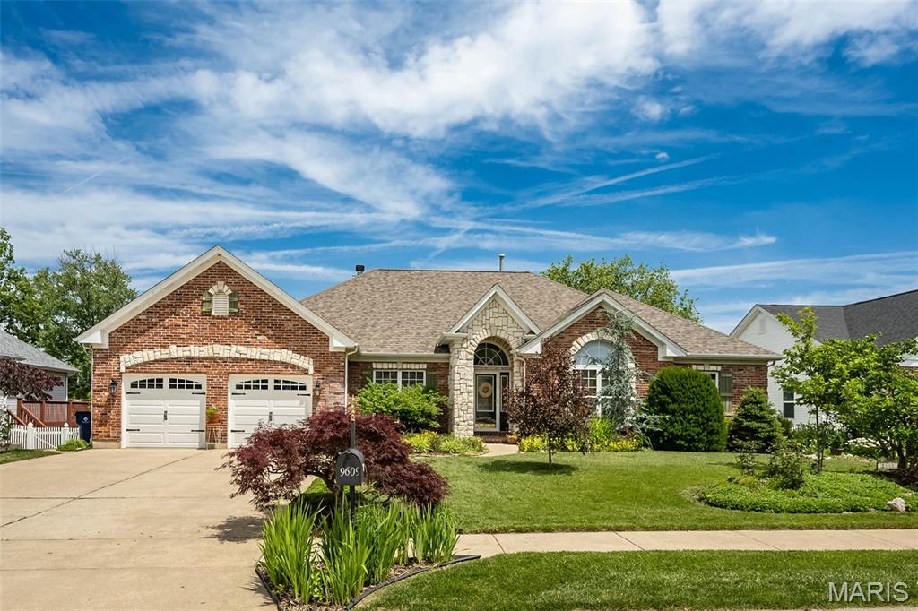 The BEST of Crestwood living! An absolutely beautiful 4 bedroom, 3.5 bth home. Over 3,200 sqr ft of living space. The white stone accents along with the brick give this home an elegant curb appeal. Quality abounds throughout the interior. The entrance welcomes you to attractive hardwood floors that flow into the vaulted great room with a wall of windows and wood burning fireplace. The kitchen features quality white custom cabinetry, high grade stainless-steel appliances, gorgeous granite tops, porcelain flooring, and a walk out to the large deck overlooking the beautiful yard. The HUGE primary bedroom offers a walk-in closet with custom built-ins, a luxury bath with a Spa World jet tub, double bowl sinks. separate shower, and ceramic tile flooring. The exceptional finished lower level has a very spacious family room with lots of natural light, a walk-out, two nice sized bedrooms, one offers a full private bath. The beautiful yard is professionally landscaped, and offers a large wood deck, a concrete patio, a storage shed, and plenty of privacy. This home is conveniently located and in the sought-after Lindbergh School District. Best to hurry and get your private showing scheduled, this home will get snatched up fast.
