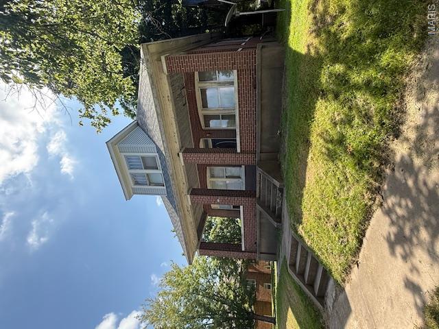 This all brick two story home on a corner lot has been recently renovated. Inside you'll find a formal living an dining room with beautifully painted hardwood floors. The living, kitchen, dining, as well as, one bath and one bedroom are on the main level. Upstairs has three large bedrooms with hardwood floors and one full bath. There is a lovely concrete covered front porch for you to enjoy year round. Alley access via the back of the home for off street parking.