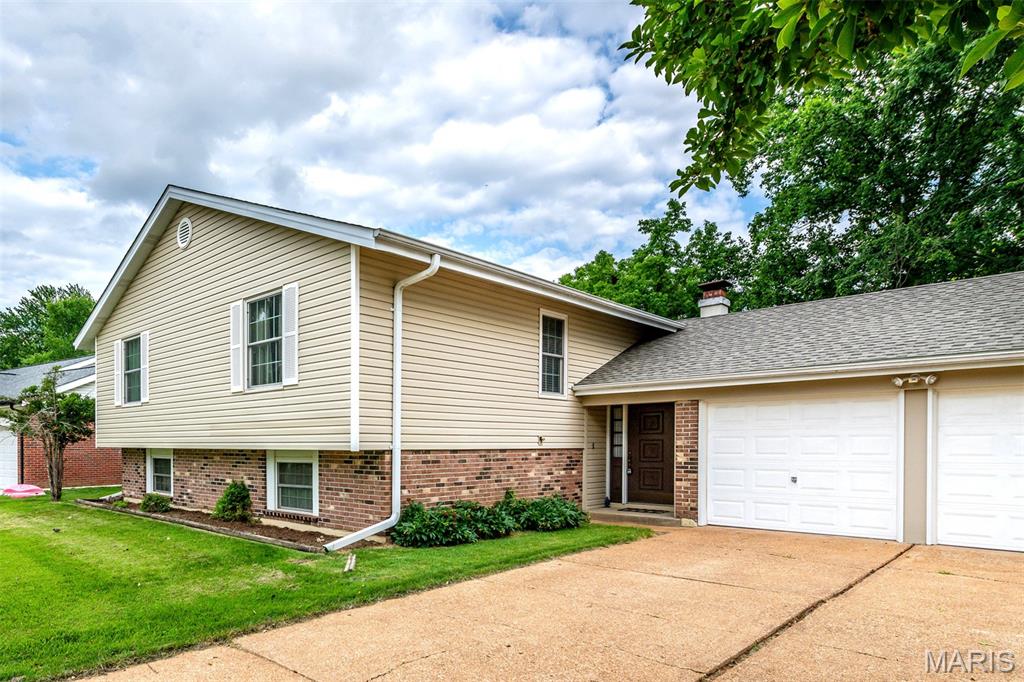 Spacious home in desirable subdivision offering a 16X12 deck & patio; newer windows & patio door; updated kitchen with ceramictile floor & 42-inch cabinets; oversized 2 car garage; cedar closet. New roof installed 2025.  Nice, clean,well-maintained home ready for you to move in.